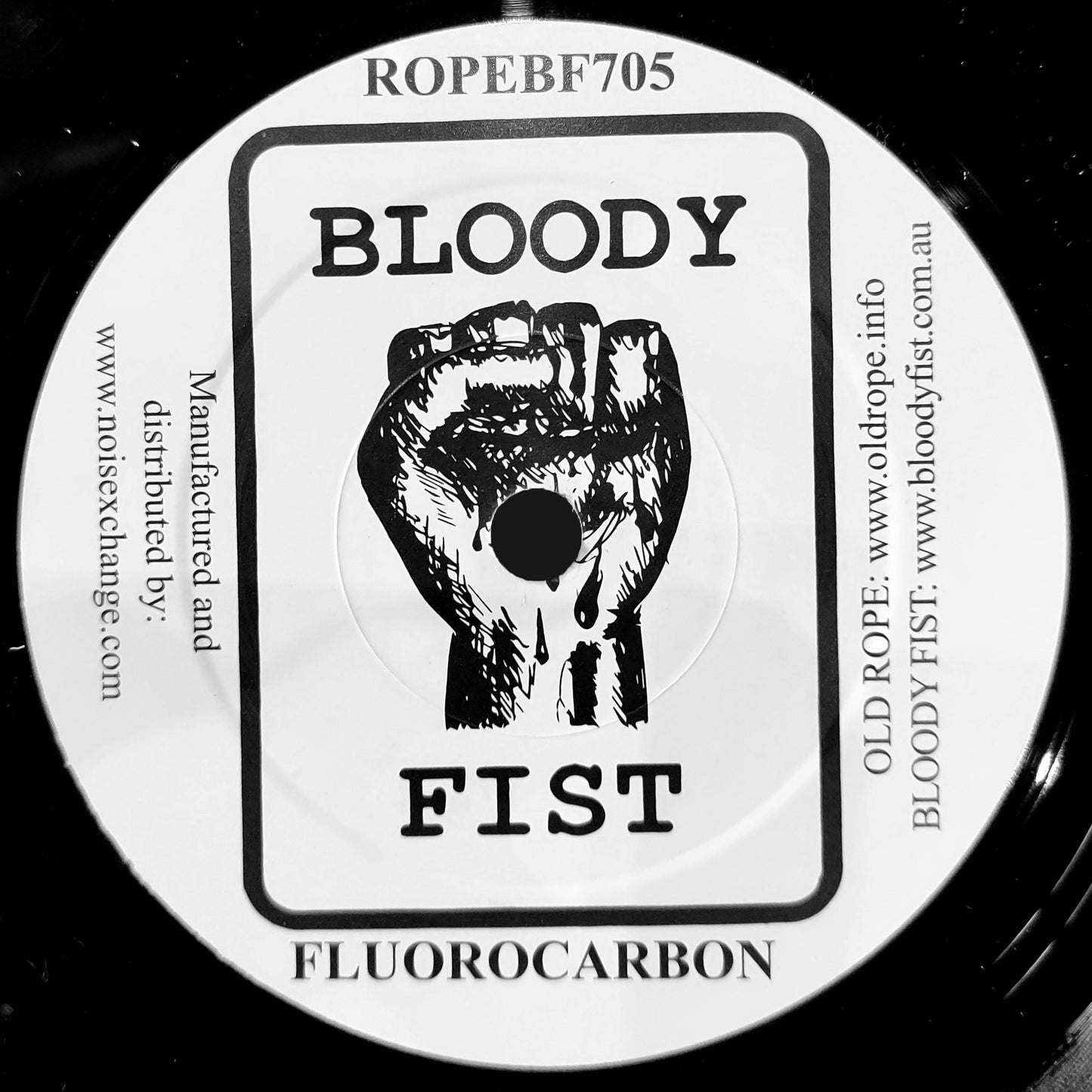 FLUOROCARBON - "DEFENESTRATION / TRACKER ACTION [SECOND VERSION]" 7"